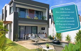 Villa neuve et cosy, piscine privée et proche de Grand Baie